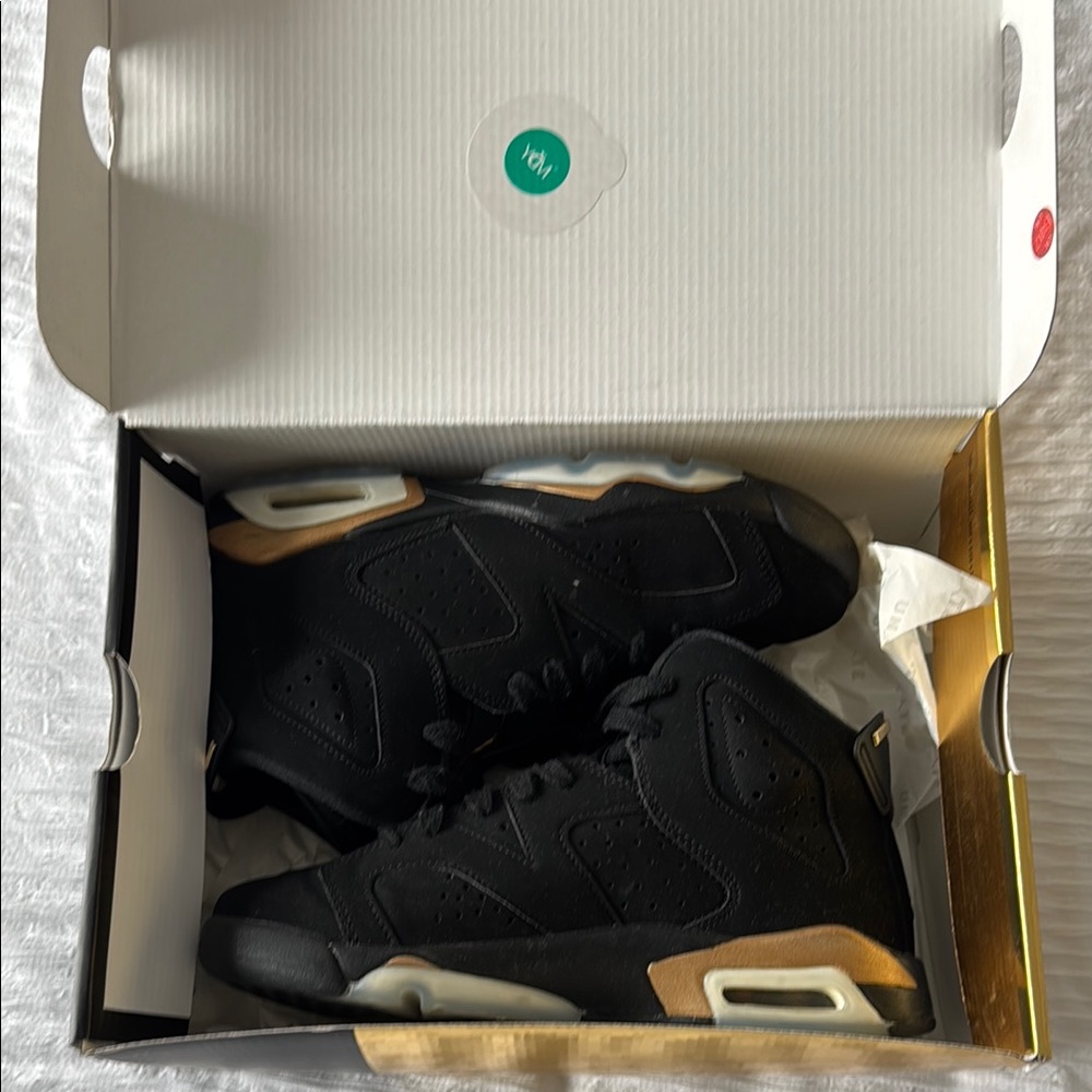 Nike Air Jordan 6 Retro Black and Gold Sneakers